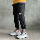 2021 Men's Side Pockets Cargo Harem Pants Fashion Ribbons Black Hip Hop Casual Male Joggers Trousers Fashion Streetwear Pants