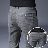 2021 Men's Stripe Casual Pants Mens Four Seasons High Quality Business Trousers Men's Straight Harem Pants